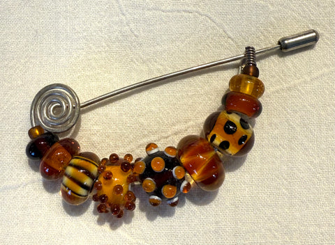 Amber/brown Pin