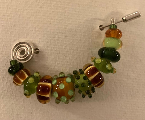 Amber/olive Pin