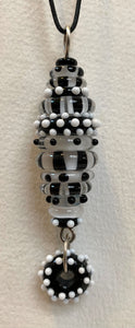 Black and white stacked bead pendant