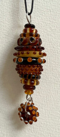 Stacked bead pendant amber brown