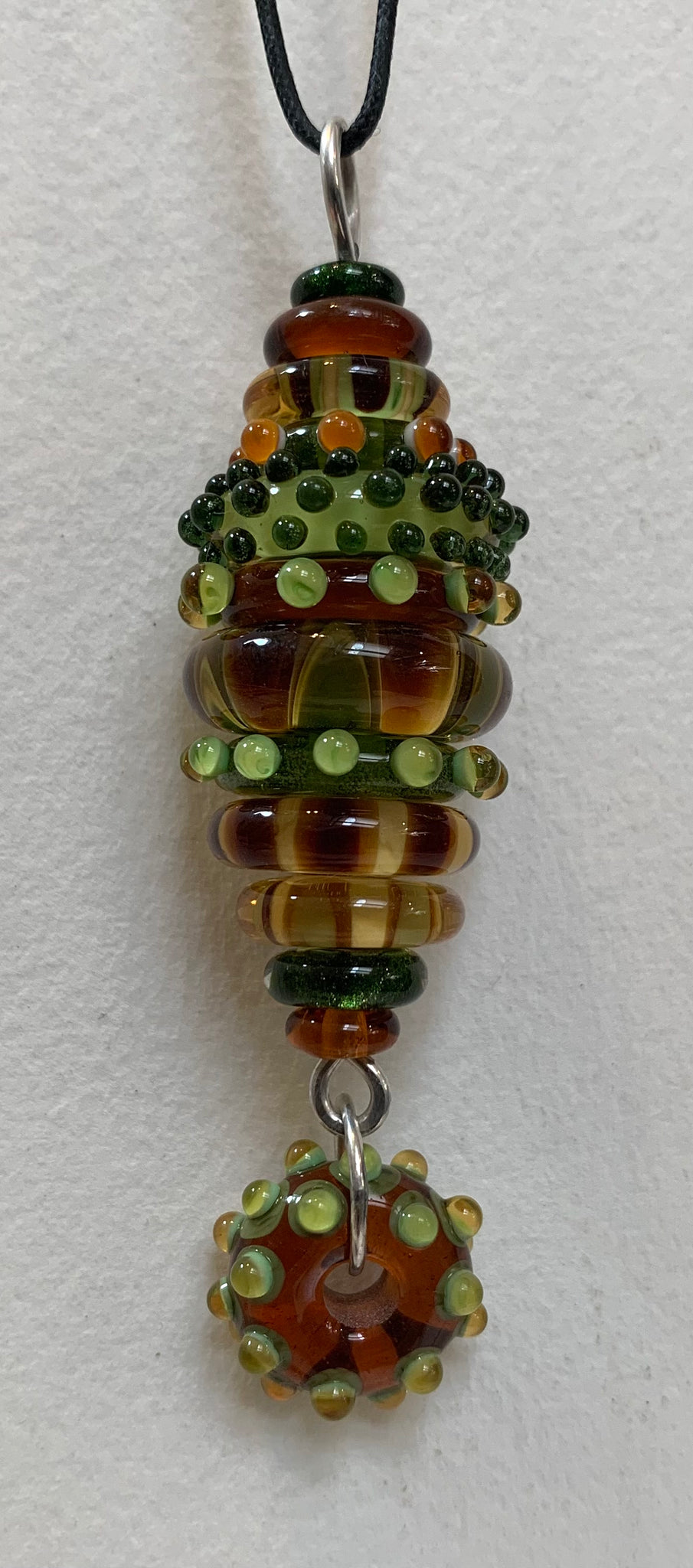 Stacked bead pendant amber green glass