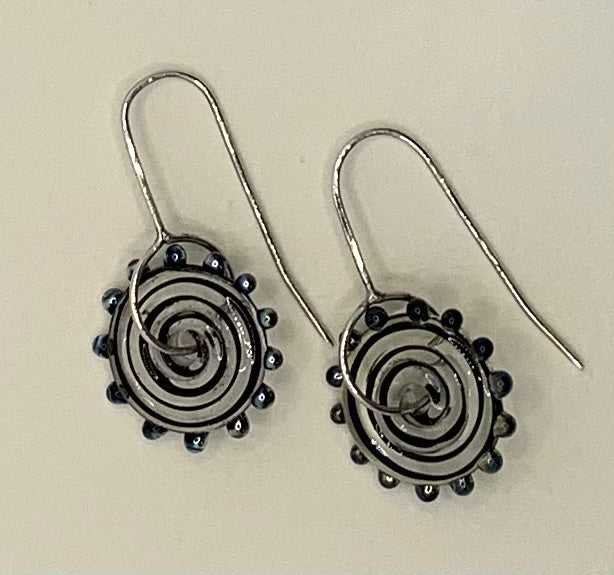 Symmetrical earrings (black spiral discs with silver dots)