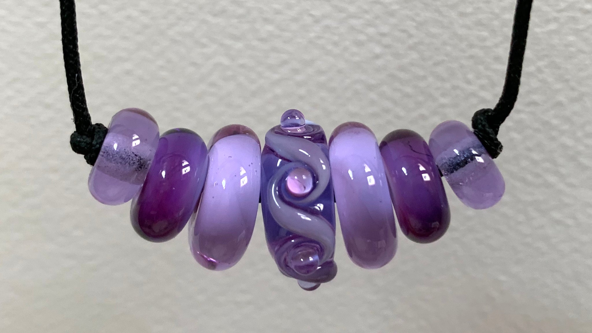Glass beads on a cord