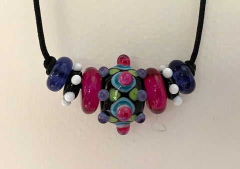 Glass beads on a cord