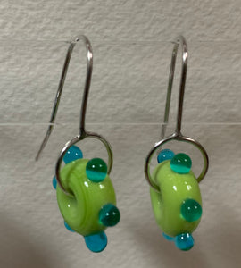 Circle earrings ( pea green with aqua dots)