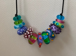 Pastel beads on a cord