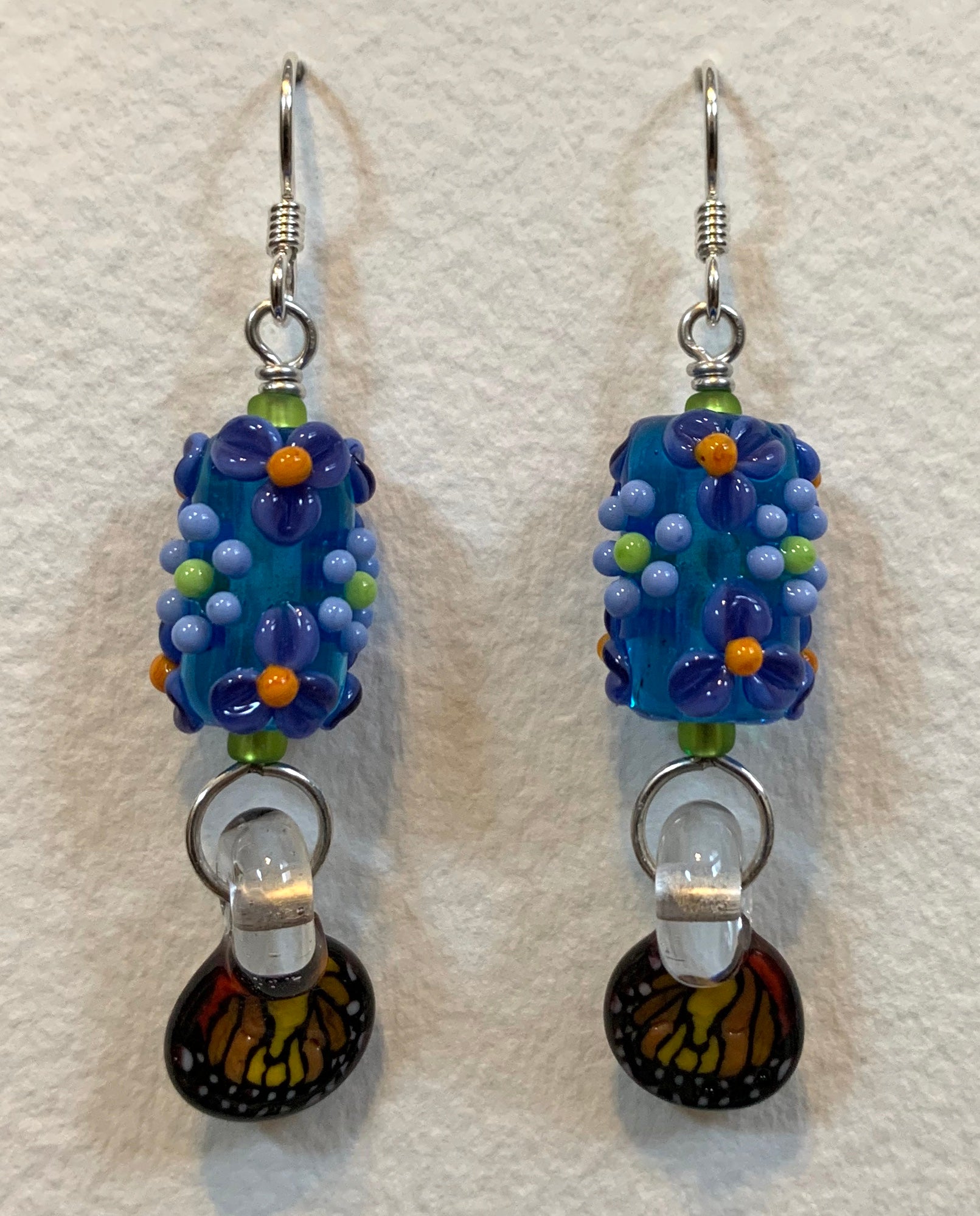 Flower earrings with butterfly wings