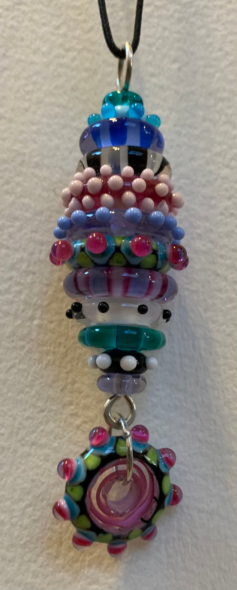 Black pink multi stacked  bead pendant