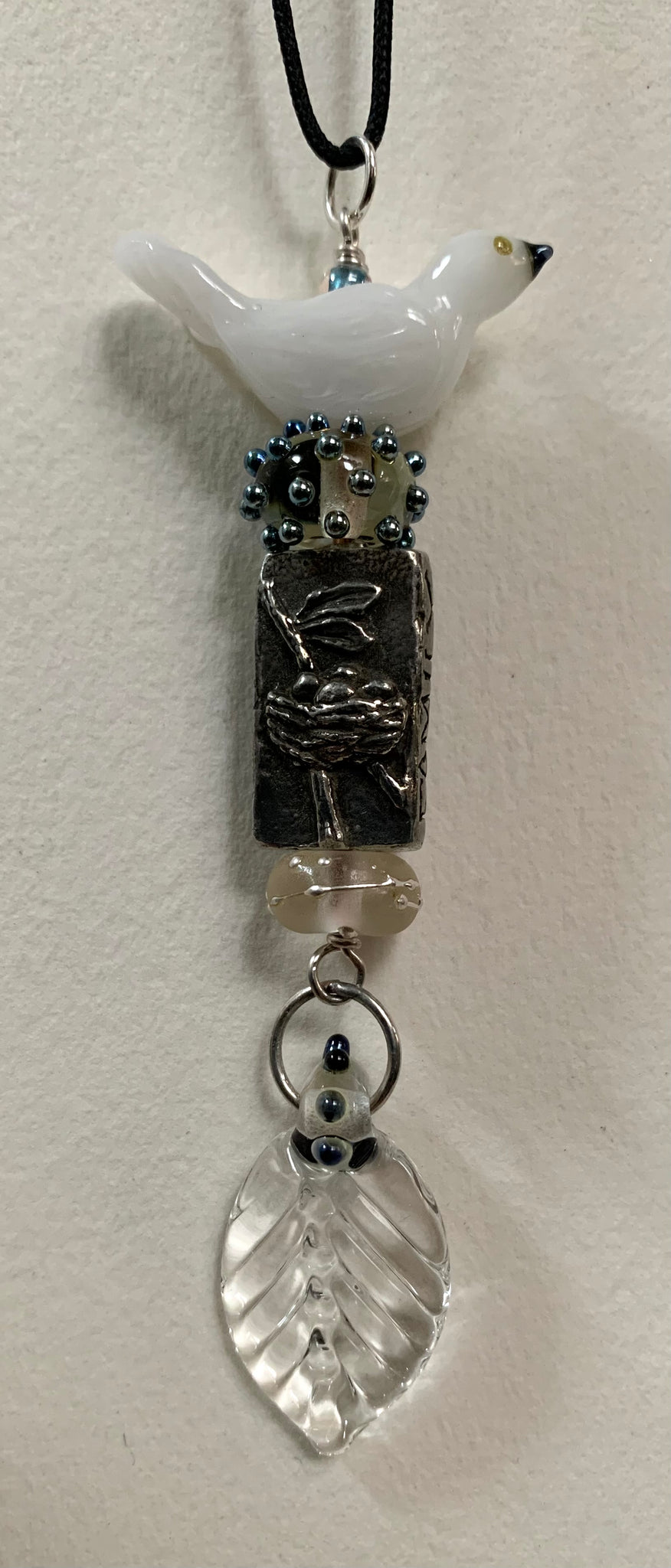 White bird pendant with pewter Family/Home bead