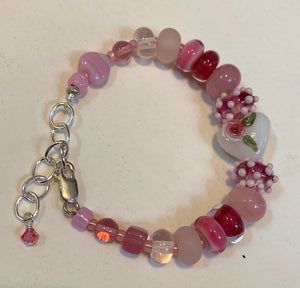 Pink bracelet with heart bead and sterling silver findings, 6 1/2”-8 1/8”