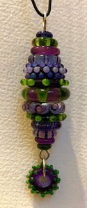 Purple and green stacked bead pendant